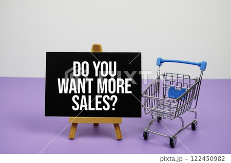 Do You Want More Sales? text message and trolley shopping cart on purple background Do You Want More Sales? text message and trolley shopping cart on purple background 122450982