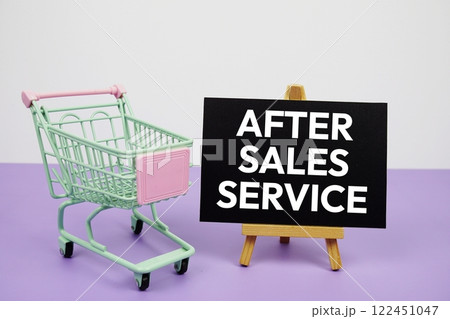After Sales Service text message and trolley shopping cart on purple background After Sales Service text message and trolley shopping cart on purple background 122451047