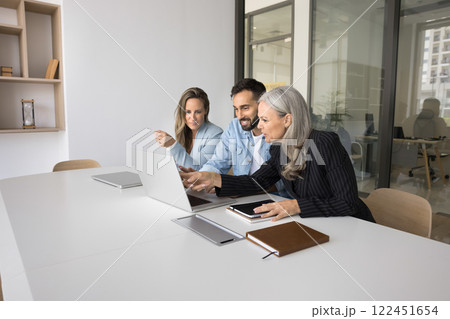 Group of diverse businesspeople negotiate, collaborate on joint online project 122451654