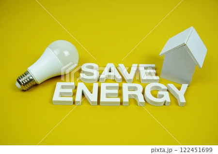 Save Energy alphabet letters with house model and LED light bulbs on yellow background, Saving and Eco friendly concept 122451699