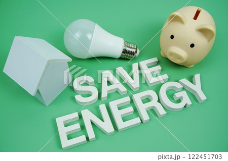 Save Energy alphabet letters with house model, piggy bank and LED light bulbs on green background, Saving and Eco friendly concept Save Energy alphabet letters with house model, piggy bank and LED light bulbs on green background, Saving and Eco friendly concept 122451703