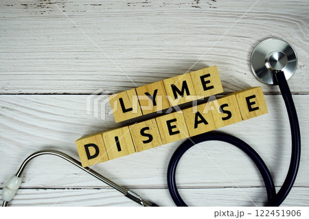 Lyme Disease with wooden blocks alphabet letters and stethoscope on wooden background, Healthy and wellness concept 122451906