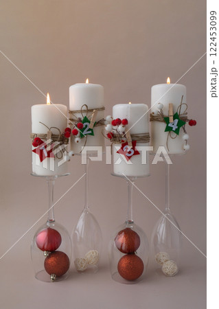 Four Advent candles calendar with Christmas zero waste decorations. Holiday preparation copy space for text. Catholic traditions of Christmas countdown new year winter 122453099