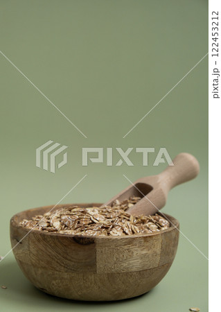 Raw oatmeal porridge Gluten free cereals. Health gut benefits. Concept of alternative whole spelt grain ingredient. Vegetarian diet recipes. Plant-based lifestyle. Copy space Protein rich Raw oatmeal porridge Gluten free cereals. Health gut benefits. Concept of alternative whole spelt grain ingredient. Vegetarian diet recipes. Plant-based lifestyle. Copy space Protein rich 122453212