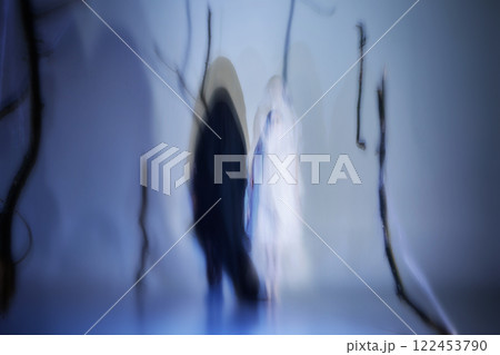 Surreal, mystical dance of ghostly ballerinas fading into mist. Light, fabric, and movement merge into surreal performance. Surreal, mystical dance of ghostly ballerinas fading into mist. Light, fabric, and movement merge into surreal performance. 122453790