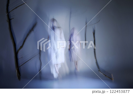 Surreal, mystical dance of ghostly ballerinas fading into mist. Light, fabric, and movement merge into one surreal performance Surreal, mystical dance of ghostly ballerinas fading into mist. Light, fabric, and movement merge into one surreal performance 122453877