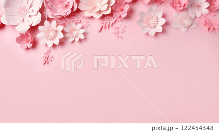 Arrangement of handcrafted paper flowers in soft pink and white hues, placed along top edge of smooth pastel pink background. For romantic themes, wedding invitations, feminine decorative projects Arrangement of handcrafted paper flowers in soft pink and white hues, placed along top edge of smooth pastel pink background. For romantic themes, wedding invitations, feminine decorative projects 122454348