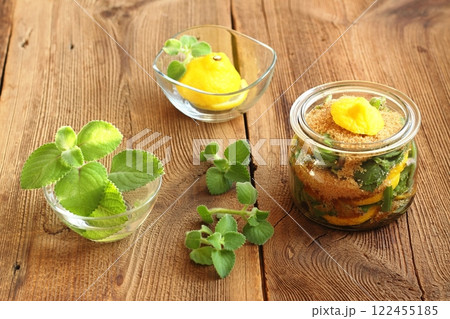 Homemade syrup made from fresh leaves of Plectranthus (Coleus) amboinicus, lemon slices and brown sugar. 122455185