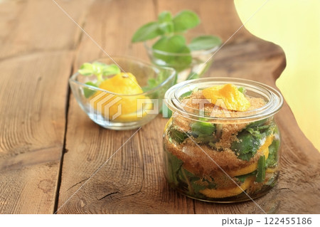 Homemade syrup made from fresh leaves of Plectranthus (Coleus) amboinicus, lemon slices and brown sugar. 122455186