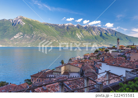 Limone Sul Garda town on shore of Lake Garda with mountains in background, Italy, Europe. 122455581