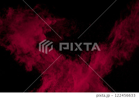 Red cloud of powdery dust is floating in the air Red cloud of powdery dust is floating in the air 122456633