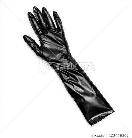 A sleek black latex glove on a white background. isolated on white background. A sleek black latex glove on a white background. isolated on white background. 122456801