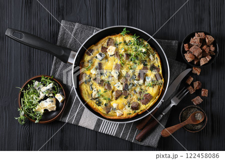 omelette with blue cheese, rye croutons and thyme omelette with blue cheese, rye croutons and thyme 122458086