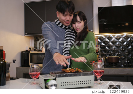 Young Asian couple living at home Young Asian couple living at home 122459923
