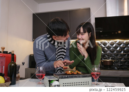 Young Asian couple living at home Young Asian couple living at home 122459925