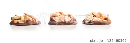 Photography of chocolate Florentines cookies with almonds and chocolate isolated on white background. Photography of chocolate Florentines cookies with almonds and chocolate isolated on white background. 122460361