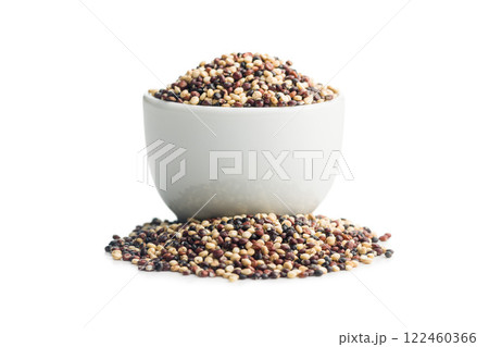 Mixed uncooked quinoa seeds in bowl isolated on white background. 122460366