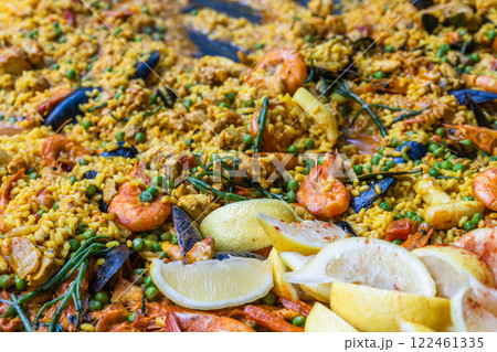 Traditional Spanish Seafood Paella with Shrimp, Mussels, and Lemon Slices Traditional Spanish Seafood Paella with Shrimp, Mussels, and Lemon Slices 122461335