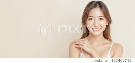Smiling young woman with flawless skin posing against a pastel background, promoting beauty, skincare, and confidence. Smiling young woman with flawless skin posing against a pastel background, promoting beauty, skincare, and confidence. 122462712
