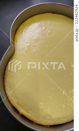 Delicious cheesecake with cottage cheese on the table, decorated with kiwi. Delicious cheesecake with cottage cheese on the table, decorated with kiwi. 122462924