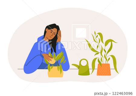 Young woman cleaning and taking care of houseplants sitting at a table, gardening at home, watering can and houseplants, hobby and leisure, home garden Young woman cleaning and taking care of houseplants sitting at a table, gardening at home, watering can and houseplants, hobby and leisure, home garden 122463096