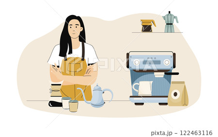 Barista in a yellow apron standing with arms crossed behind a coffee shop counter featuring a professional coffee machine, takeaway cups, and brewing equipment 122463116