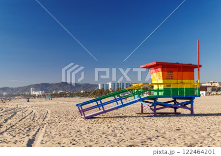 Vibrant lifeguard tower painted in LGBTQ rainbow colors 122464201
