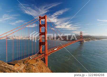 Iconic view of the Golden Gate Bridge bathed in warm sunlight 122464208