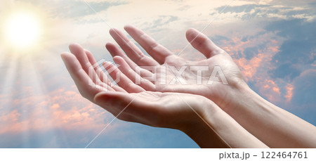 The outstretched hands of a praying man The outstretched hands of a praying man 122464761