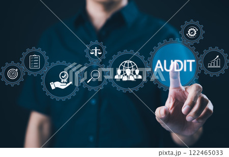 Audit business concept. Businessman interacts with word "AUDIT" and business icons. Check to examine accounting and finance of business, Evaluation, and examination financial, standard certification, Audit business concept. Businessman interacts with word "AUDIT" and business icons. Check to examine accounting and finance of business, Evaluation, and examination financial, standard certification, 122465033