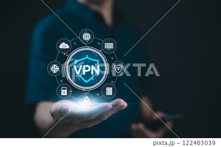 Virtual private network (VPN) security concept. A hand holding virtual VPN shield with digital icons for cybersecurity, encryption, and secure internet protocols. Online privacy and secure browsing. Virtual private network (VPN) security concept. A hand holding virtual VPN shield with digital icons for cybersecurity, encryption, and secure internet protocols. Online privacy and secure browsing. 122465039