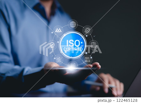 ISO Certified Quality Assurance Concept. Glowing icon ISO Certified with icons representing compliance, standards, and quality assurance. ISO certification for business quality and reliability. QA QC 122465128
