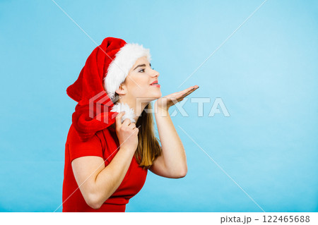 Woman christmas costume sending kisses Woman christmas costume sending kisses 122465688