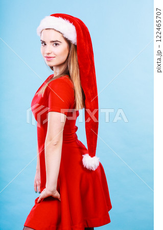 Happy woman wearing Santa Claus helper costume Happy woman wearing Santa Claus helper costume 122465707
