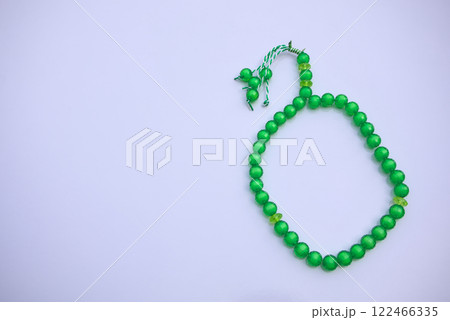 Flat Lay of Muslim Prayer Rosary Tasbih, Misbaha on Clean White Surface 122466335