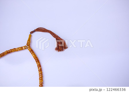 Islamic Background with Tasbeeh Prayer Beads, Rosary, Flat Lay Composition on White Background 122466336