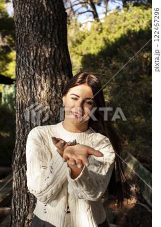 young pretty brunette woman on sea coast, lifestyle people concept 122467296