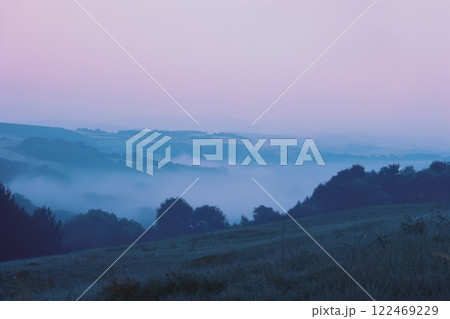 Mystical Dawn Over Fog-Enshrouded Valley Mystical Dawn Over Fog-Enshrouded Valley 122469229