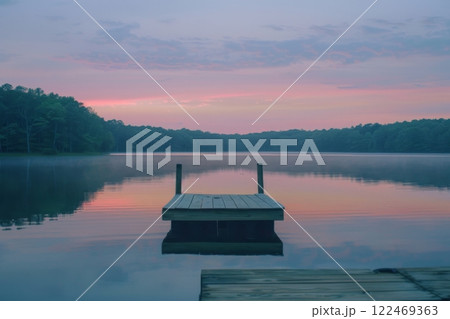 Serene Lake Sunset with Wooden Dock Serene Lake Sunset with Wooden Dock 122469363