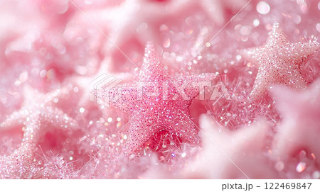 ピンク色のキラキラきらめくグリッターと可愛い星型の背景 122469847