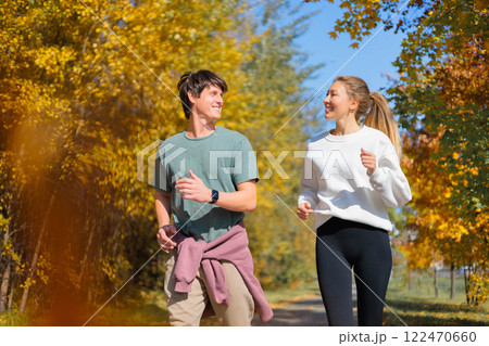 Full body profile couple young two friends athletic sportswoman athlete woman man 30 years old  122470660