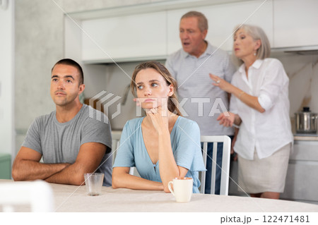 Old couple quarrel with young couple Old couple quarrel with young couple 122471481