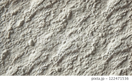 粗い白い石膏壁のテクスチャのクローズアップ 122471536