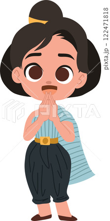 happy child in elegant thai outfit celebrating songkran festival with hands together in a respectful thai greeting 122471818