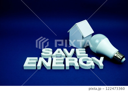 Save Energy alphabet letters with house model and LED light bulbs on navy blue background, Saving and Eco friendly concept Save Energy alphabet letters with house model and LED light bulbs on navy blue background, Saving and Eco friendly concept 122473360