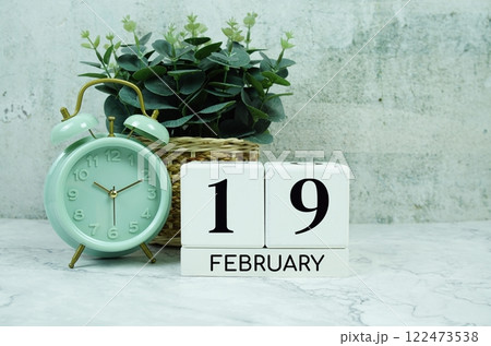 Wooden Calendar Showing the Date of February 19th. Day 19 of February month Wooden Calendar Showing the Date of February 19th. Day 19 of February month 122473538