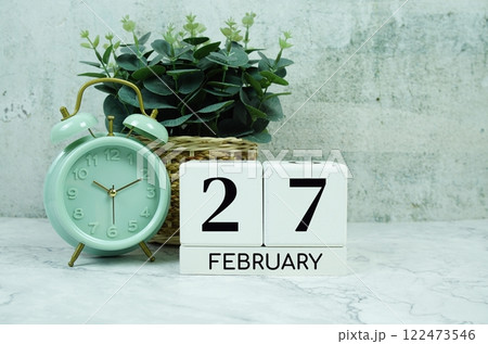 Wooden Calendar Showing the Date of February 27th. Day 27 of February month 122473546