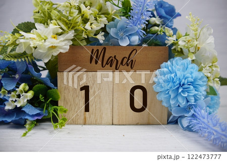 Wooden Calendar Showing the Date of March 10th. Day 10 of March month 122473777