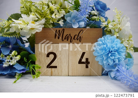 Wooden Calendar Showing the Date of March 24th. Day 24 of March month 122473791