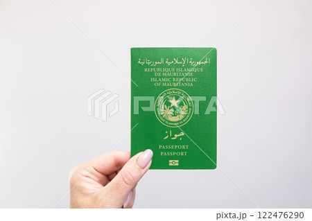 Passport Mauritania Held Against Simple White Background. Astana, Kazakhstan, 26 october 2024 Passport Mauritania Held Against Simple White Background. Astana, Kazakhstan, 26 october 2024 122476290